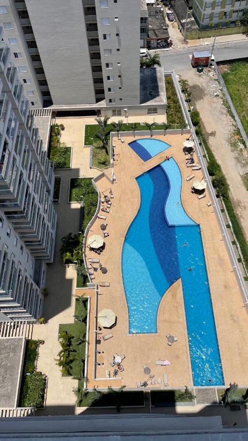 Lazer De Resort A Poucos Passos Da Praia Guaruja Bagian luar foto