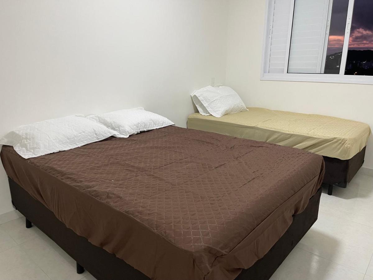 Lazer De Resort A Poucos Passos Da Praia Guaruja Bagian luar foto
